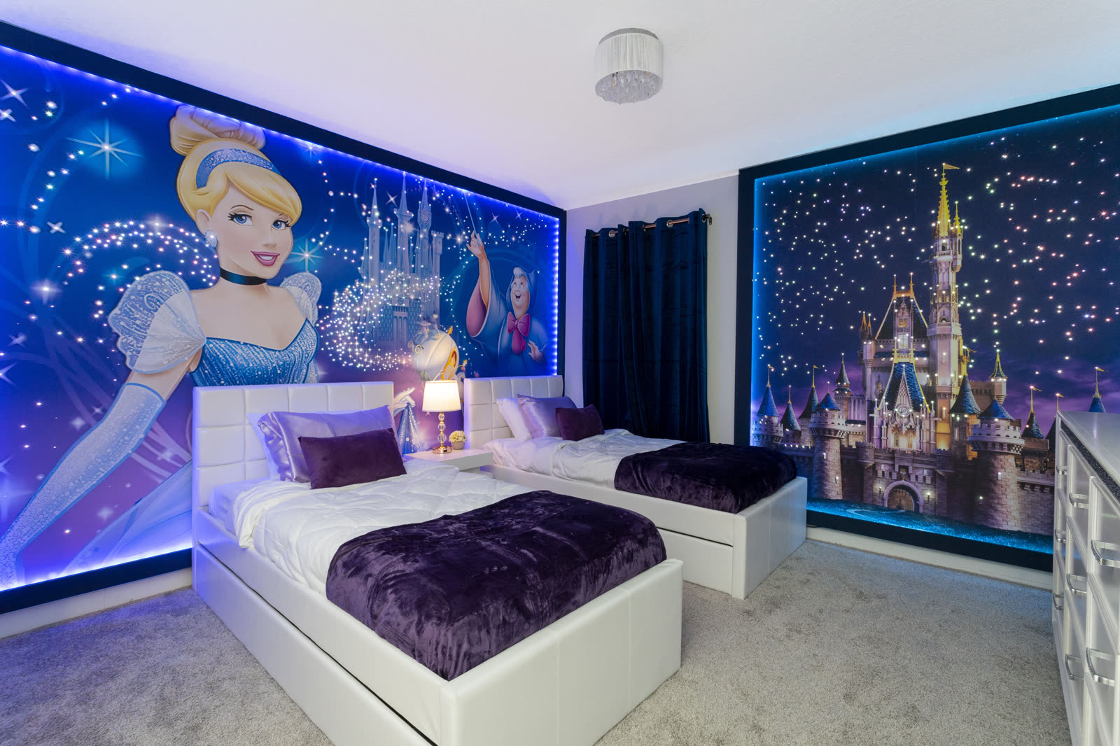 Cinderella themed bedroom with glowing castle murals at The Disney Villa