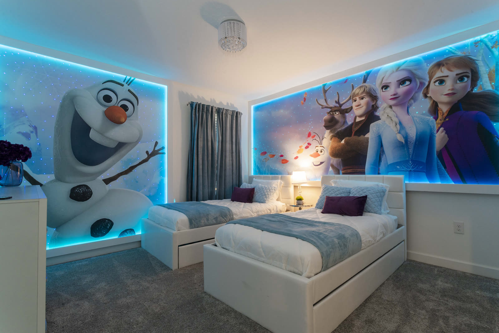 Frozen themed bedroom with backlit Elsa, Anna, and Olaf murals