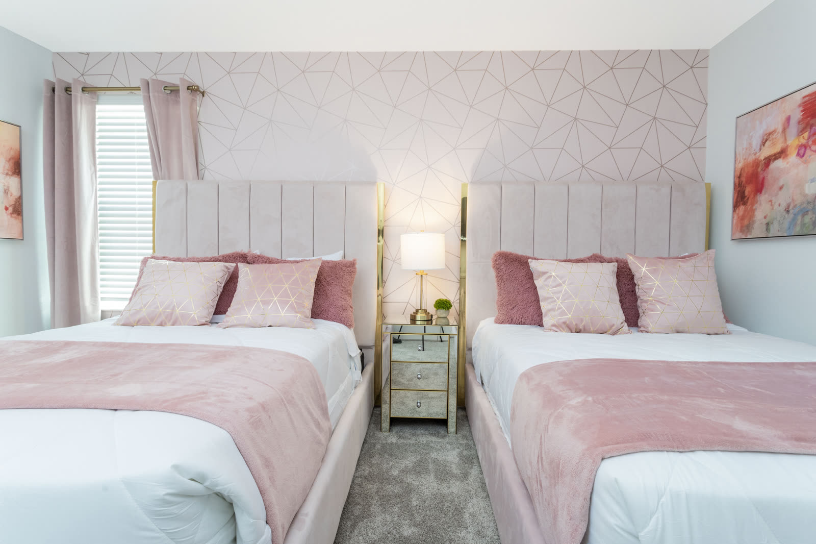 Blush pink bedroom at The Incredibles villa